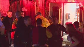 2 shot during Super Bowl party at Hollywood Hills mansion