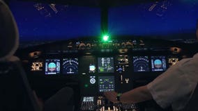 Laser strikes against aircraft have surged to a new record, FAA says