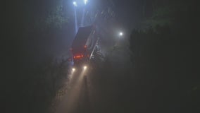 Amazon truck stuck on hill in Montecito Heights, threatening home below