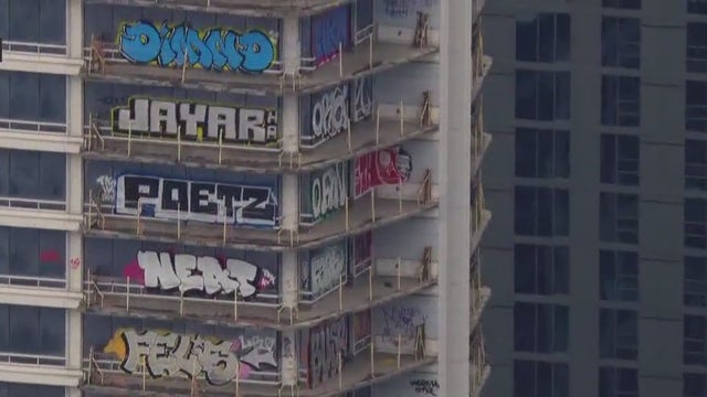 Taggers vandalize 27 floors of DTLA high-rise with graffiti; 2 arrested