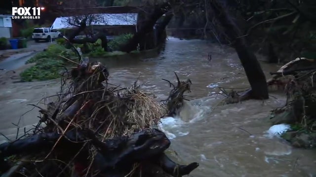Clean-up begins in Topanga Canyon halfway through historic rainstorm