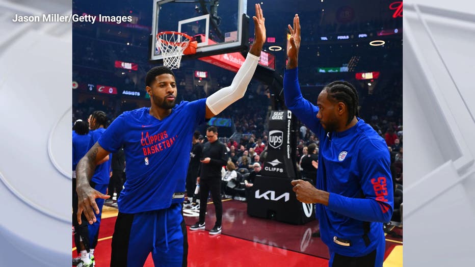 Paul George #13 celebrates with Kawhi Leonard #2 of the LA Clippers prior to the game against the Cleveland Cavaliers at Rocket Mortgage Fieldhouse on January 29, 2024 in Cleveland, Ohio. (Photo by Jason Miller/Getty Images)