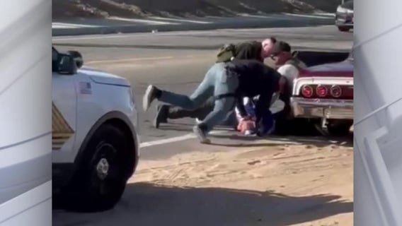 San Bernardino County deputies seen on video punching, kicking suspect in head