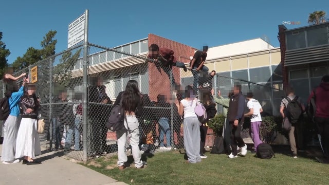 Students scale fence at Taft High School in Woodland Hills amid shooting threat