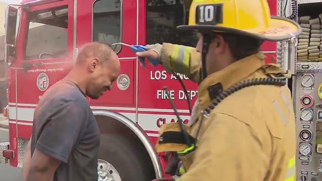 Burglary suspect stuck in chimney calls 911 for rescue