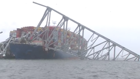 Baltimore Key Bridge cleanup continues amid heavy rain, wind