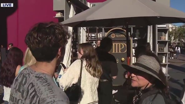 Fans line up at The Grove for Taylor Swift popup kiosk