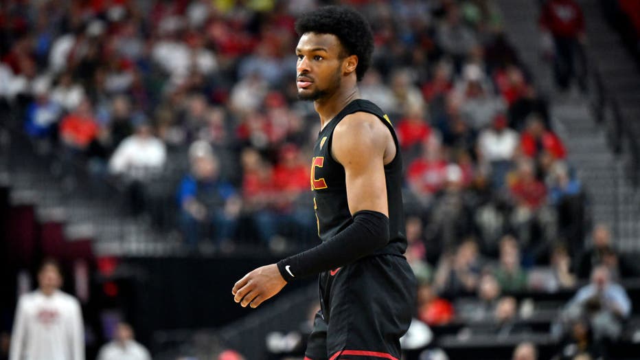 Bronny James #6 of the USC Trojans looks on in the second half of a quarterfinal game against the Arizona Wildcats during the Pac-12 Conference basketball tournament at T-Mobile Arena on March 14, 2024 in Las Vegas, Nevada. The Wildcats defeated the Trojans 70-49. (Photo by David Becker/Getty Images)