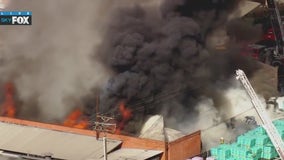 Massive fire rips through Lynwood commercial building
