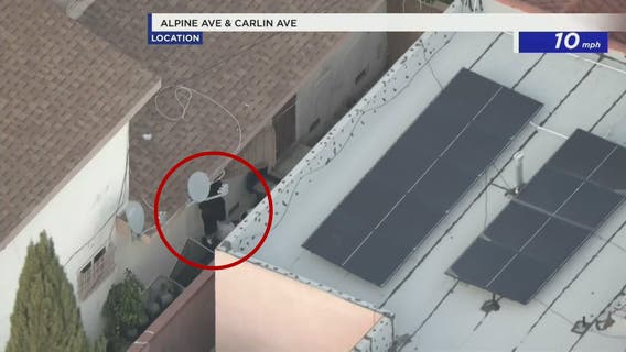 Suspects in custody after police chase suspect jumps into window of home