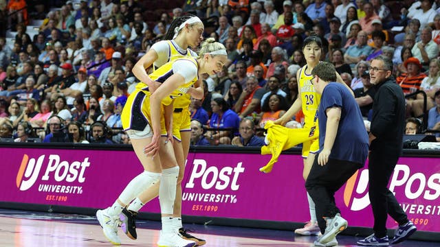LA Sparks rookie Cameron Brink helped off the court after suffering knee injury
