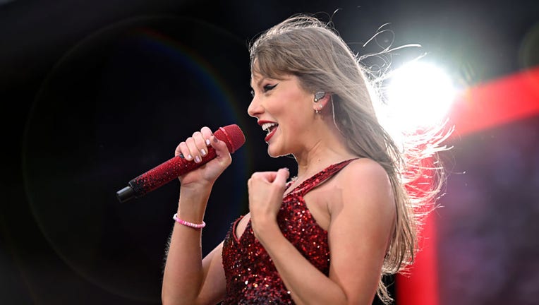 Taylor Swift performs on stage during during