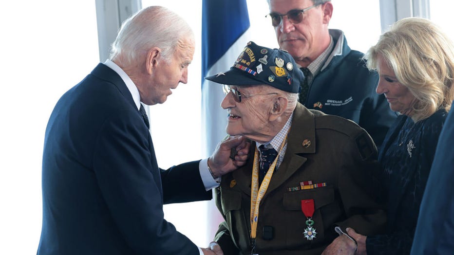 U.S. President Joe Biden and first lady Jill Biden greet American World War II veterans before a ceremony marking the 80th anniversary of D-Day at the Normandy American Cemetery on June 6, 2024 in Colleville-sur-Mer, France. (Photo by Win McNamee/Getty Images)
