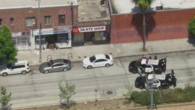 Armed man barricaded inside Exposition Park business escapes from police