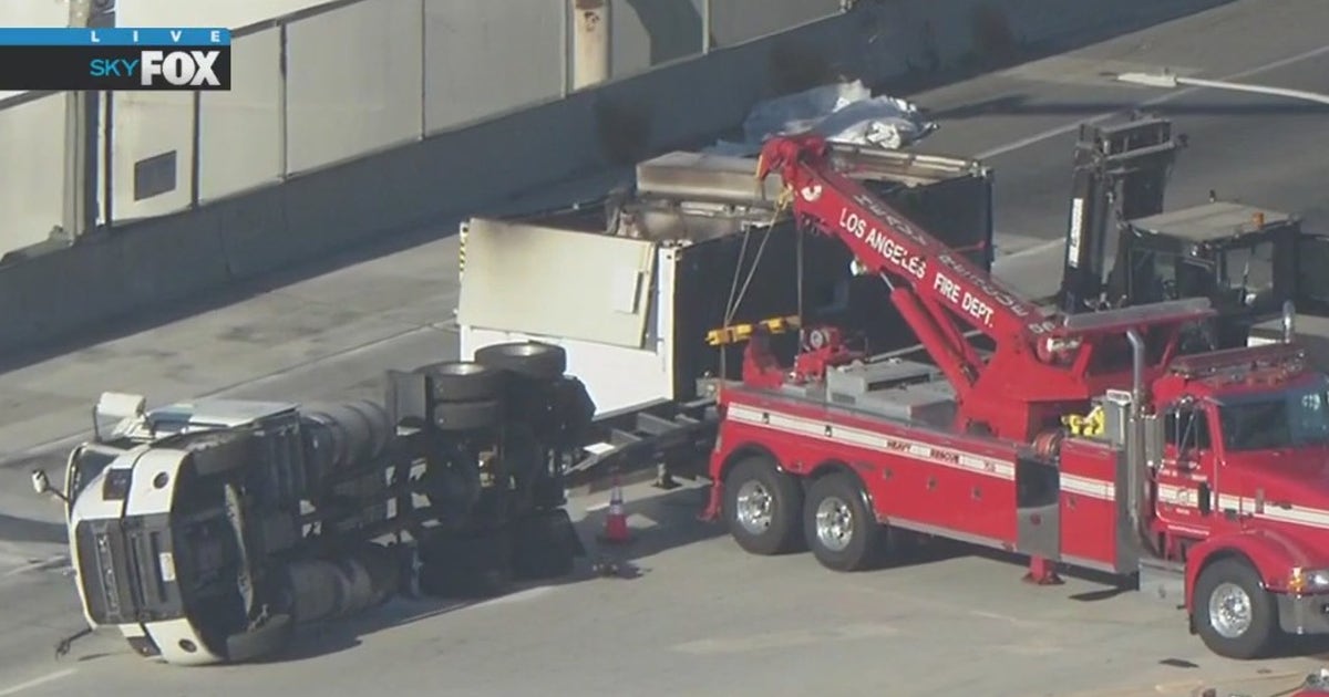 San Pedro freeway reopened after big rig carrying lithium-ion batteries ...