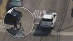 Pursuit vehicle goes airborne, woman makes a run for it before dramatic takedown