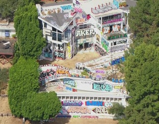 Hollywood Hills mansion covered in graffiti, taken over by