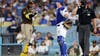 Fans at Dodger Stadium throw baseballs at San Diego Padres players in NLDS Game 2