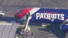 Dodgers arrive in LA on Patriots team plane