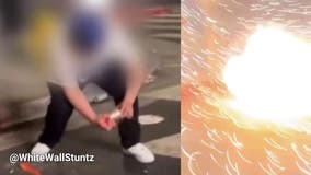 Dodgers fan blows up hand with firework in downtown LA