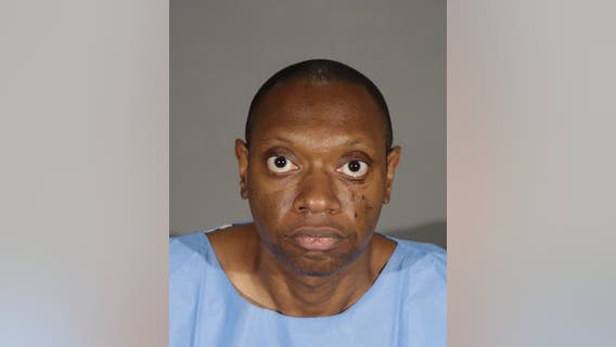 Man wakes up to find brother stabbing their mother to death