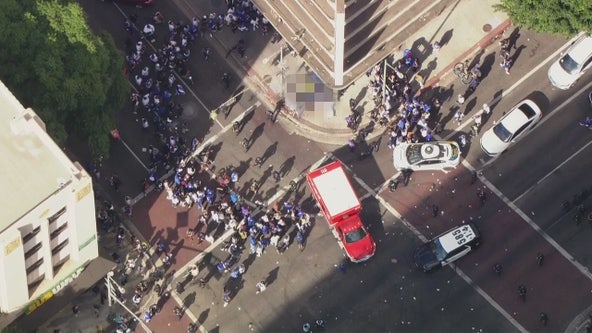 Dodgers fan who fell off roof during World Series celebration in critical condition, family says