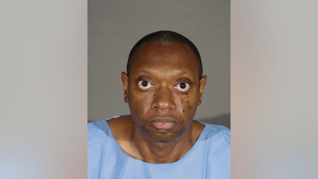 Man wakes up to find brother stabbing their mother to death