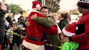 'Hood Santa' gives out toys to hundreds of Long Beach children days after donated toys stolen