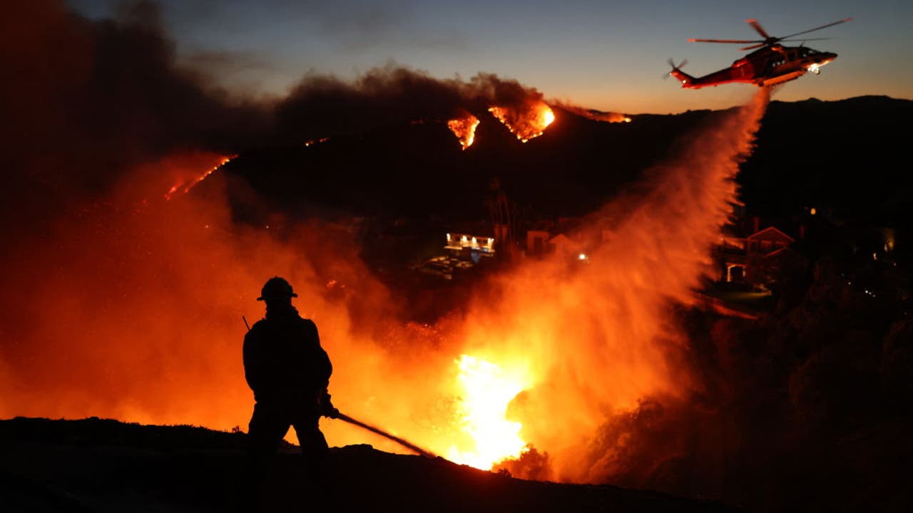 LIVE: Palisades Fire forces mass evacuations, burns down homes as strong winds continue to fuel the flames