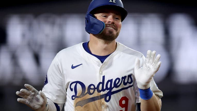 Gavin Lux #9 of the Los Angeles Dodgers reacts to histwo run home run, to take an 8-1 lead over the Miami Marlins, during the third inning at Dodger Stadium on May 07, 2024 in Los Angeles, California. (Photo by Harry How/Getty Images)