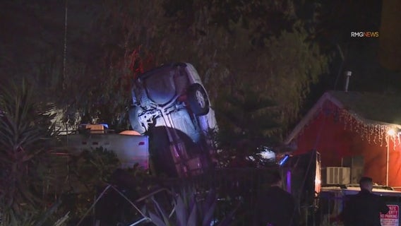 Robbery suspect crashes car into South LA backyard following pursuit