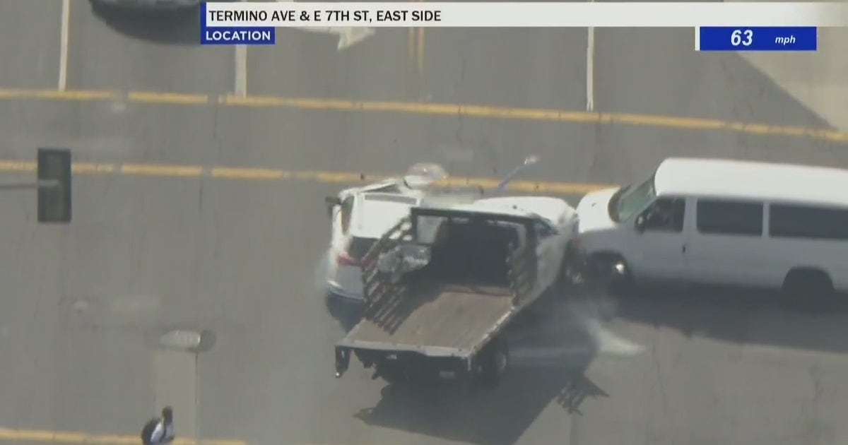 Pursuit suspect in custody after crashing into multiple cars, building ...