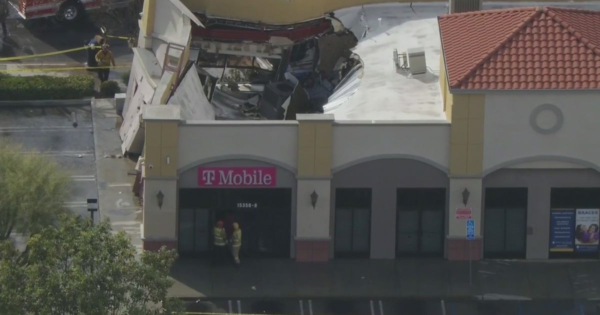 Roof of North Hills building collapses after sheared fire hydrant ...
