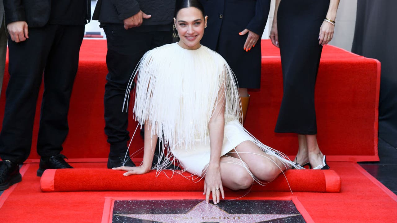 Gal Gadot receives star on Walk of Fame as protesters disrupt ceremony