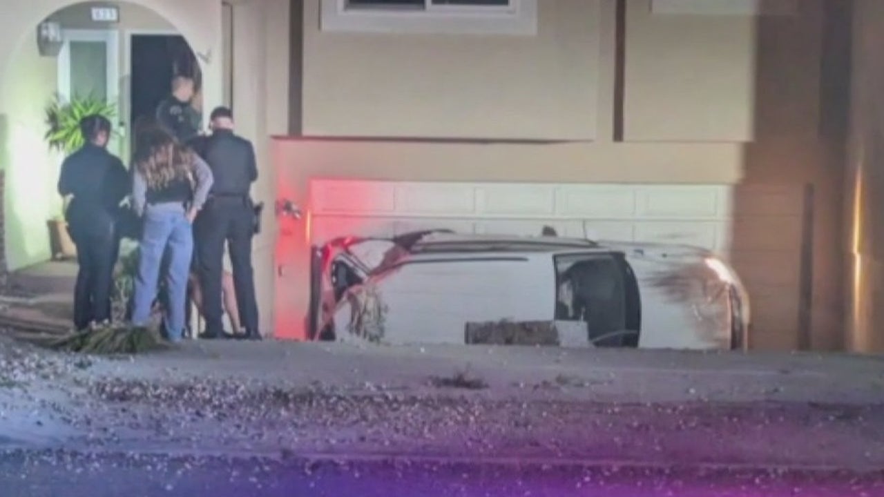 Car goes airborne, crashes into Redondo Beach home