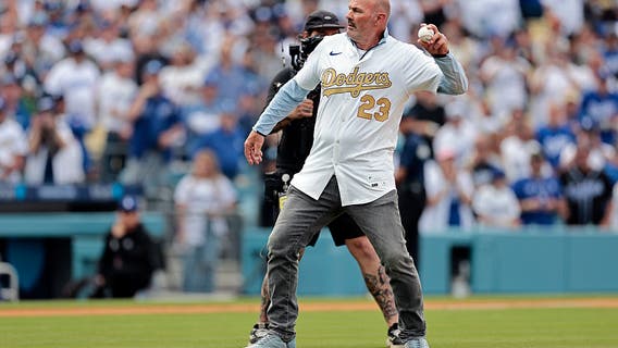 VIDEOS: Kirk Gibson-Freddie Freeman first pitch, Ice Cube World Series trophy rollout in Dodgers home opener