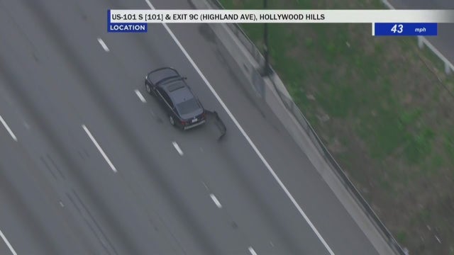Police chase suspect hides in North Hollywood shopping center parking garage