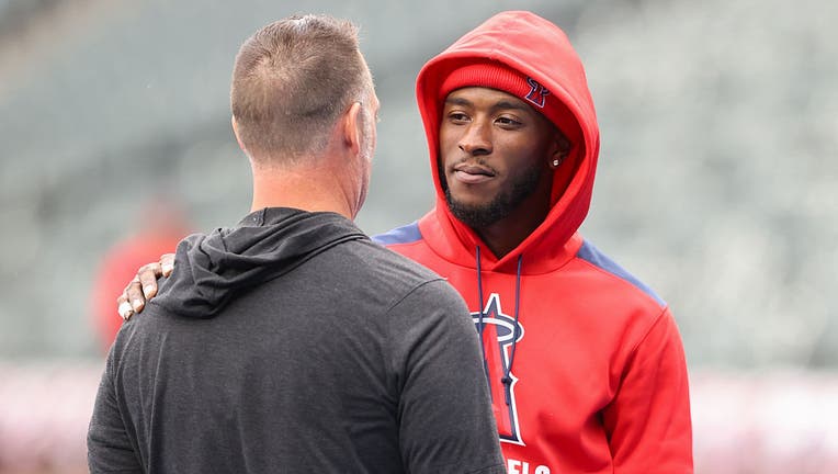 Tim Anderson #77 of the Los Angeles Angels talks with a member of the Chicago White Sox prior to the game between the Los Angeles Angels and the Chicago White Sox at Rate Field on Thursday, March 27, 2025 in Chicago, Illinois. (Photo by Griffin Quinn/MLB Photos via Getty Images)