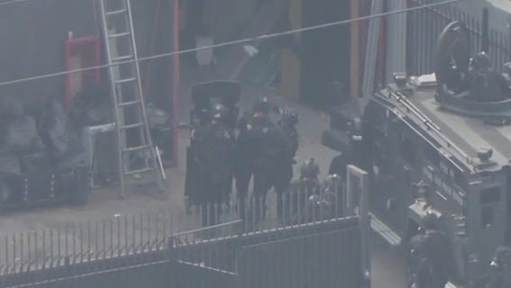 SWAT standoff lasts for more than half a day in South LA