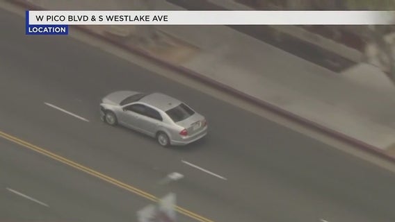 Pursuit suspect ditches car in Koreatown, runs into nearby apartment complex