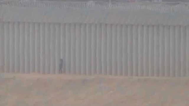 2 US Border Patrol officers are charged with taking bribes to wave in people without documents