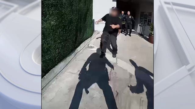 WATCH: Cops tackle man accused of trying to sell stolen sports merch