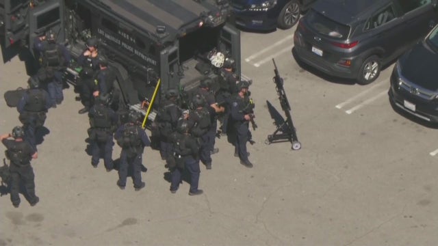 Armed man barricades in Sunland laundromat after alleged GTA