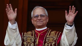 How does a pope choose their name?