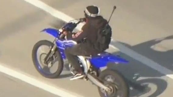 Allegedly-armed dirt bike rider leads car chase across Los Angeles