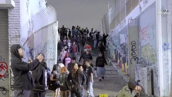 Mob damages downtown LA buildings, vandalizes Metro trains