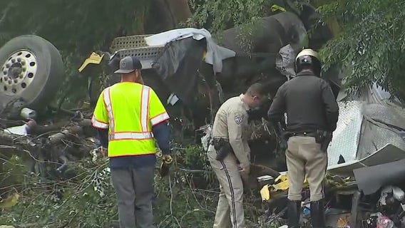 Semi crashes through 210 Freeway wall in Arcadia