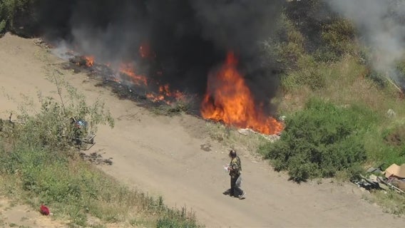 Sepulveda Basin fire: Crews knock down blaze that ignited near homeless encampment
