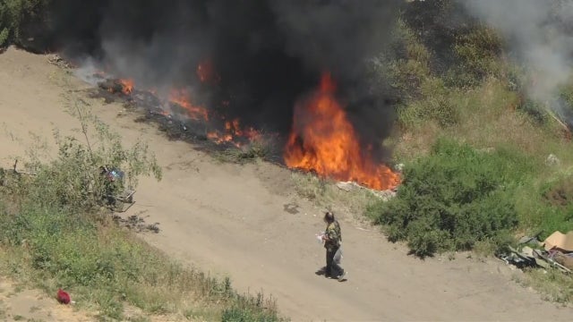 Sepulveda Basin fire: Crews knock down blaze that ignited near homeless encampment