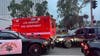 Woman arrested after allegedly driving car into LAFD ambulance